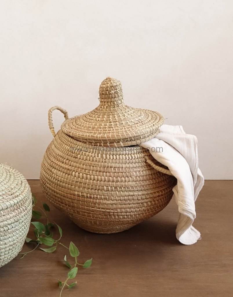 Alibaba Nursery Basket / Natural Borassus Stem Plain looking Small size Basket. Round shaped with handles. Easy to use.